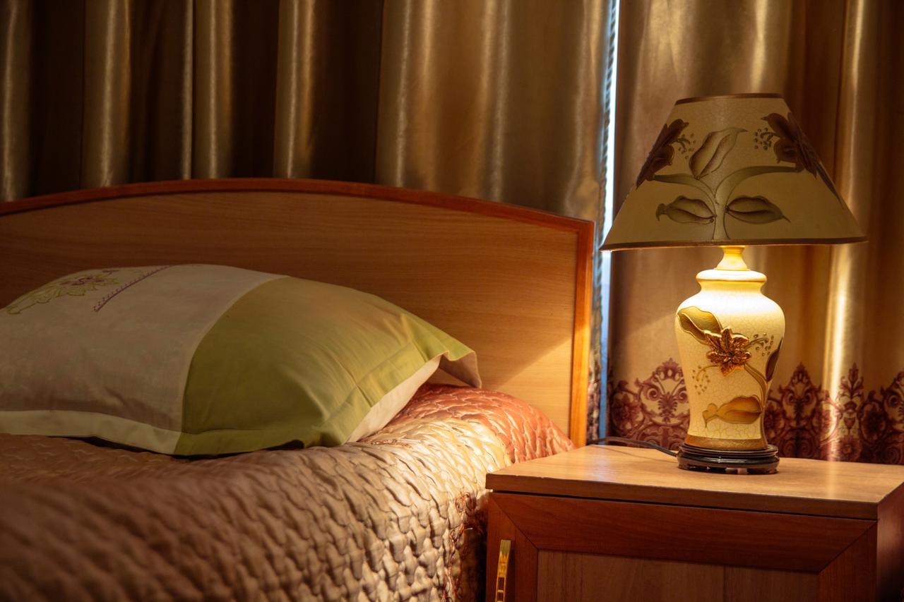Enirest Hotel Karakol Bagian luar foto
