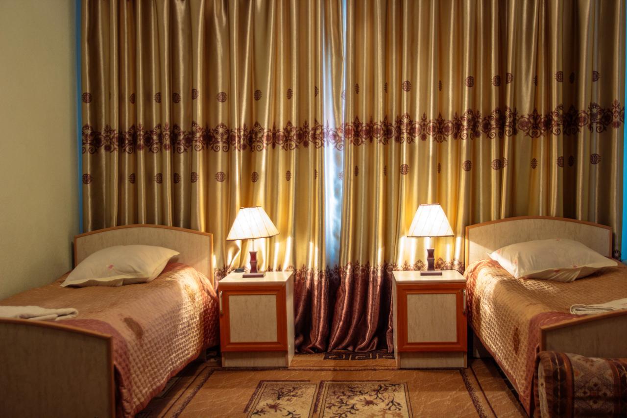 Enirest Hotel Karakol Bagian luar foto